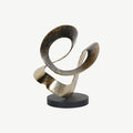 zensoe-zensoe-054-abstract-metal-ribbon-sculpture-with-black-base image 1